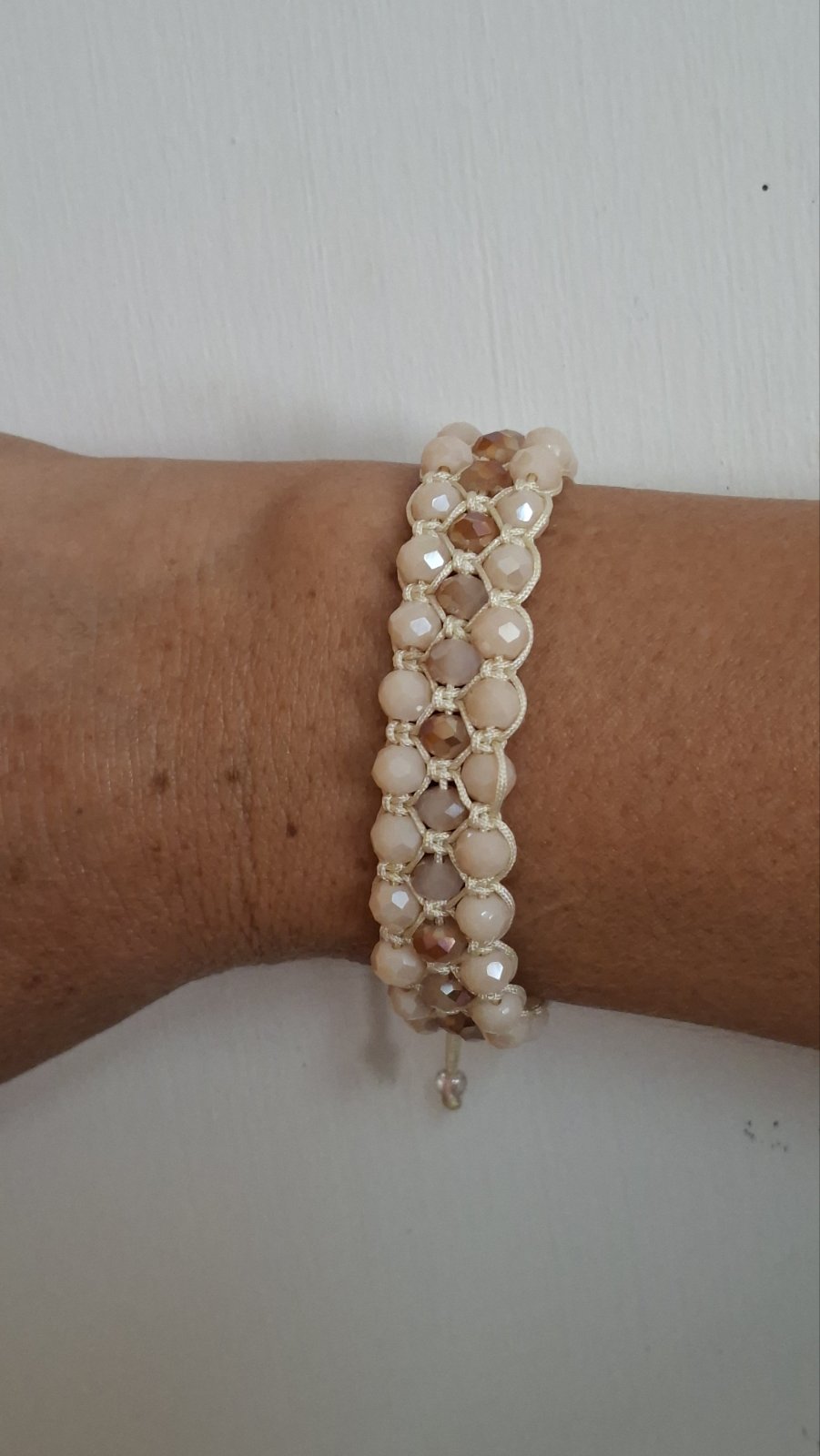 Close-up of shimmering faceted beads on handmade macrame bracelet – Georgia Create