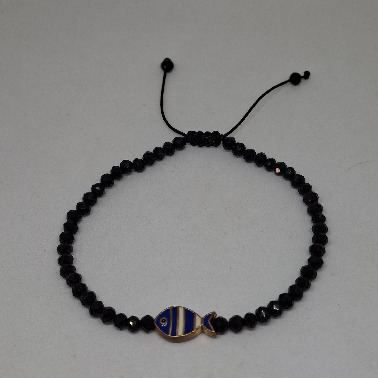Handmade fish charm beaded anklet in black