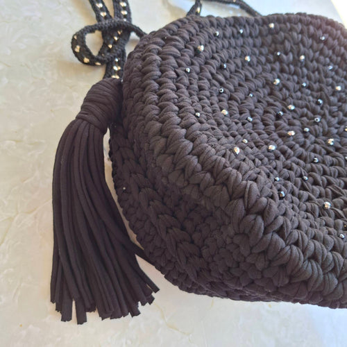 Side view of handmade black round crochet bag – artisan accessory Georgia Create Cyprus