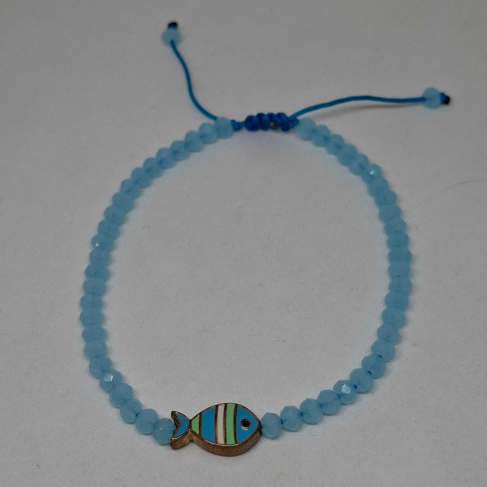 Handmade fish charm beaded anklet in blue