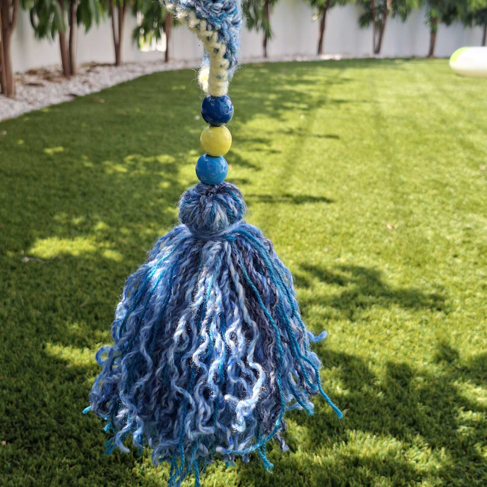 Fluffy blue tassel with wooden beads on handmade crochet garden hanging – Georgia Create Cyprus