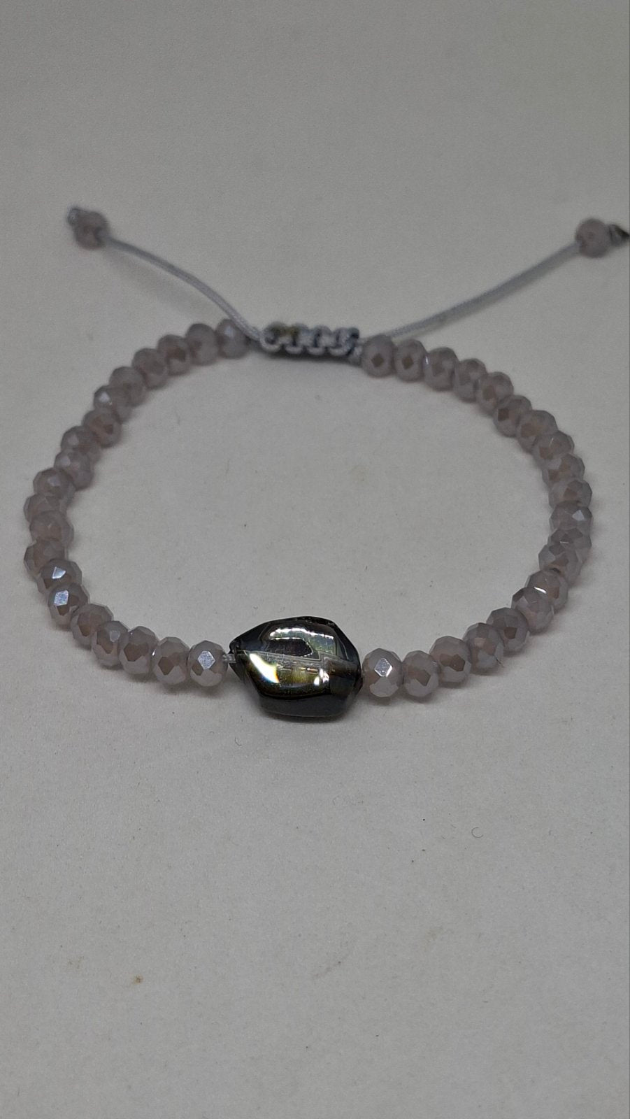 Detail of hex crystal beads on handmade bracelet – Georgia Create