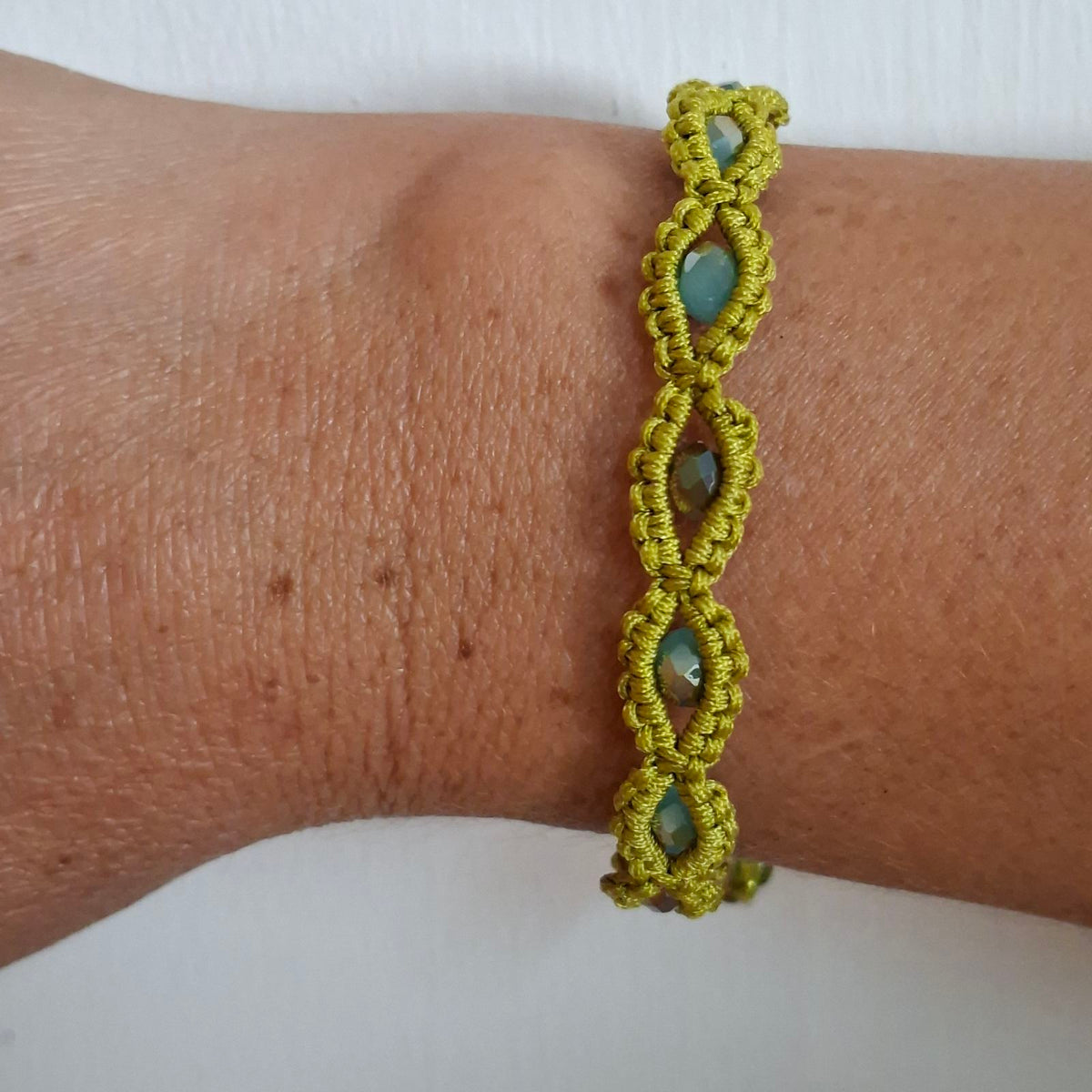 Olive Green Drops Beaded Macramé Bracelet worn on wrist