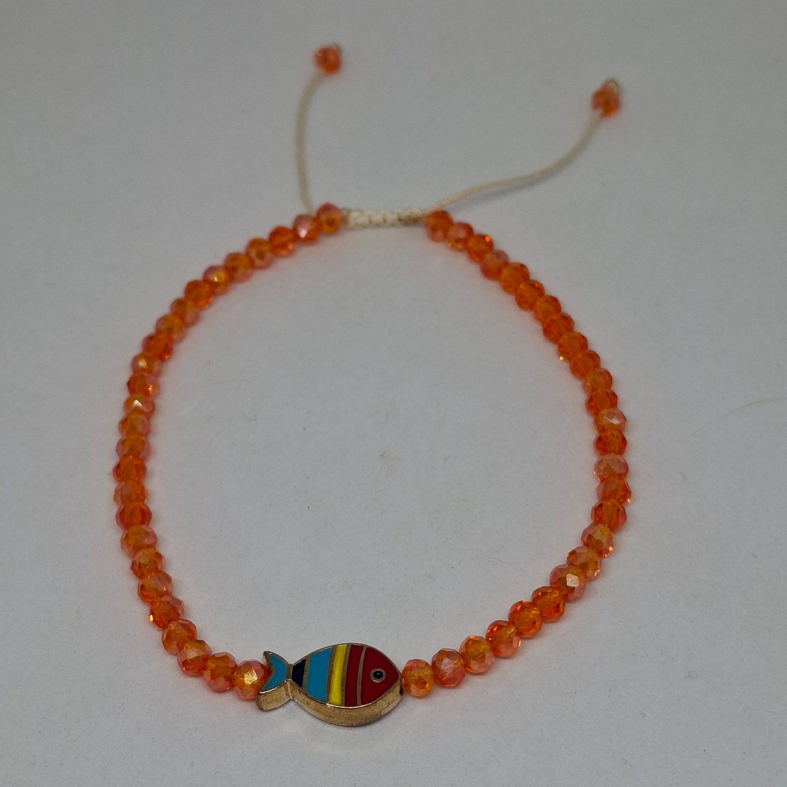 Handmade fish charm beaded anklet in orange
