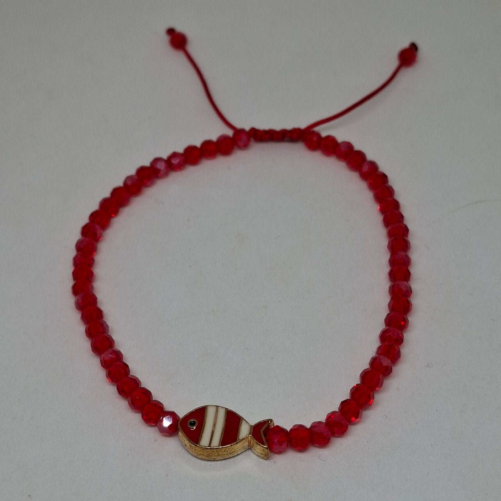 Handmade fish charm beaded anklet in red